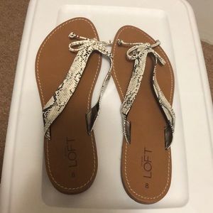 Never worn Loft flip flop
